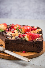 Healthy brownie decorated with berry fruits