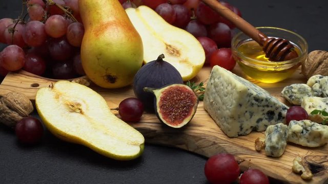 Video of roquefort or dorblu cheese and grapes