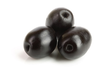 whole black olives isolated on white background macro