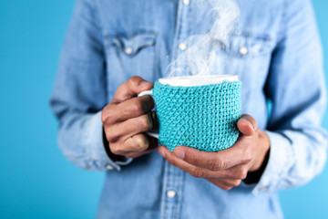 Man holding a coffee mug