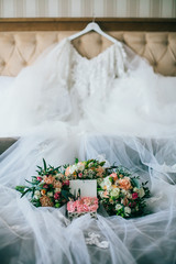 Wedding rings in a box with flowers. Accessories for wedding ceremony. 