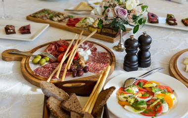 Banquet healthy food served on the white table, restaurant food, delicious appetizer 