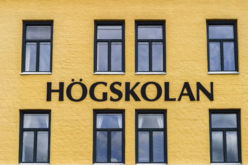 Swedish University College sign on a wall
