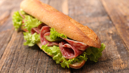 sandwich with salami and salad
