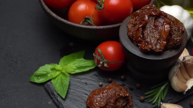 Canned Sundried or dried tomato halves in wooden bowl