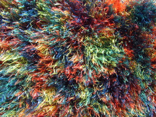 Furry multicolored fabric texture, nice vivid rainbow colors, cheerful design