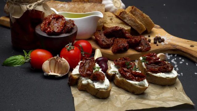 bruschetta with Canned Sundried or dried tomato halves on craft pepper