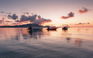Fish boats at sunrise, Zakynthos Island, Greece.
