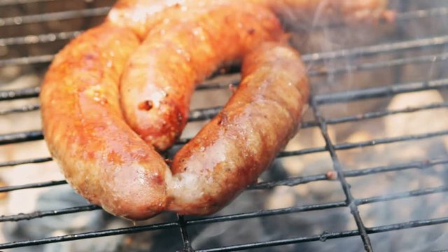 Grilled sausages on bbq. Variety Original Nuremberg Rostbratwurst . Pork ground meat, dill, nutmeg, garlic, cardamom, marjoram in the natural gut. There are also other types: rostbratwurst, currywurst