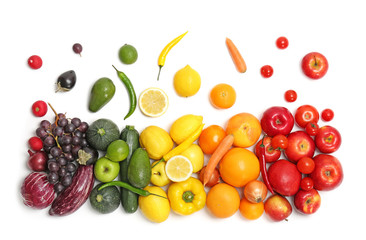 Rainbow composition with fresh vegetables and fruits on white background, flat lay