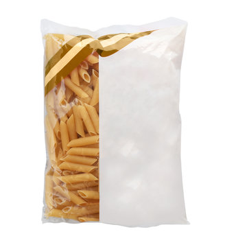 Uncooked penne pasta in plastic bag on white background, top view