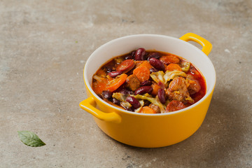 Traditional portuguese goulash with cabbage, beans and ribs.
