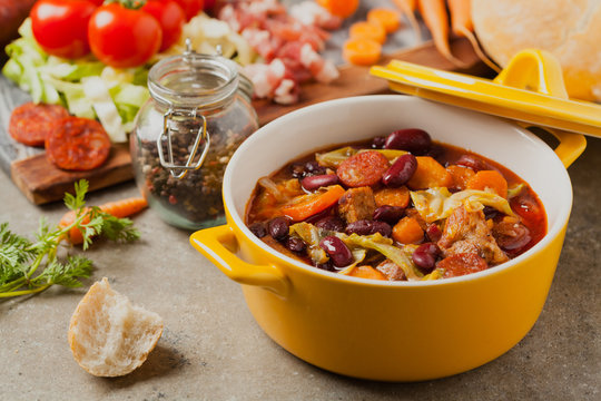 Traditional portuguese goulash with cabbage, beans and ribs.