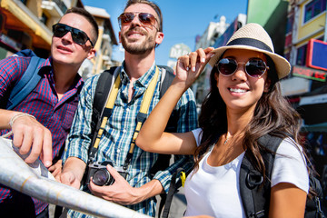 Group of tourist backpacker friends traveling in Bangkok Thailand on holidays