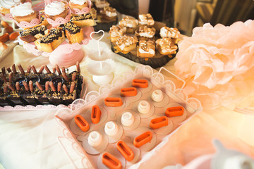 Different kinds of baked sweets on a buffet