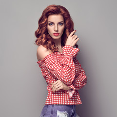 PinUp Portrait Beauty Redhead Girl.Curly hairstyle