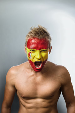 Football Fan With Spain Flag Painted On His Face