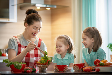 Happy family in the kitchen.