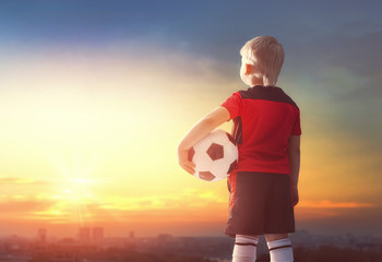 Boy playing football