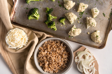 Fresh food prep healthy meal with broccoli, cauliflower and whole grains