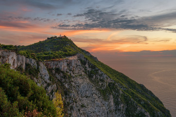 Fototapeta na wymiar Kampi, the place for the most beautiful sunset in Zakynthos island. Summer time sunset in Zante