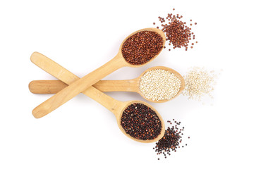 Black red white quinoa seeds in wooden spoon isolated on white background. Top view