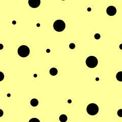 Seamless pattern. Black polka dot on the yellow background