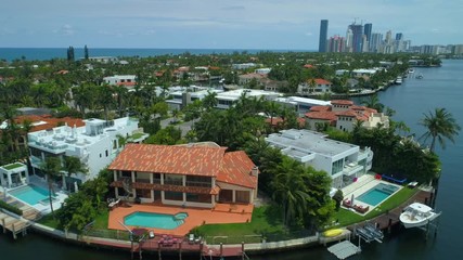 Drone aerial Luxury Miami waterfront homes real estate 4k 24p