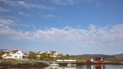 Fototapeta premium Great weather in May blue skies and white clouds, Salhus in Bronnoysund Northern Norway