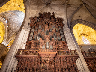Interior of Seville Cathedral, Santa Maria de la Sede, gothic style architecture in Spain, Andalusia.