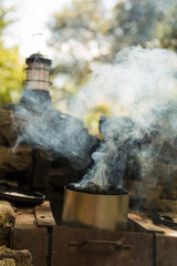 Charcoal being prepared for meal cooking during camping trip