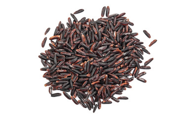 Black wild rice isolated on white background close up. Top view. Flat lay