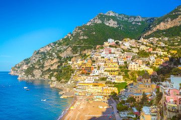 Morning view of Positano cityscape on coast line of mediterranean sea, Italy