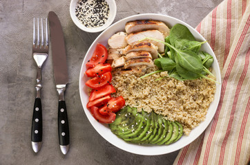 Healthy salad bowl with quinoa and chicken