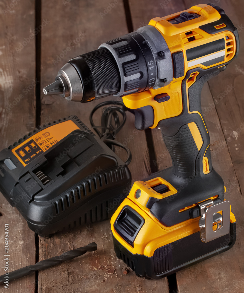 Wall mural cordless drill, screwdriver, battery charger and drill