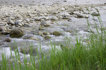 mountain stream flowing from the glacier