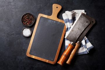 Butcher. Vintage meat knives, spices and board
