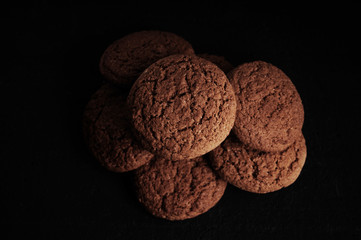 oatmeal cookies on a black table