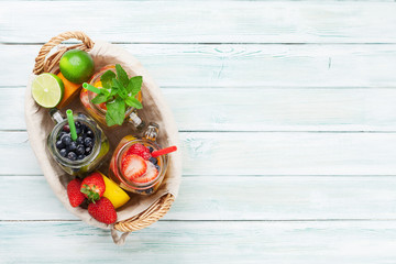 Fresh lemonade with summer fruits and berries