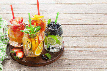 Fresh lemonade with summer fruits and berries