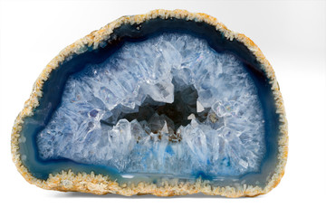 Geode with crystals of light-blue color. Cross section of natural stone. - obrazy, fototapety, plakaty