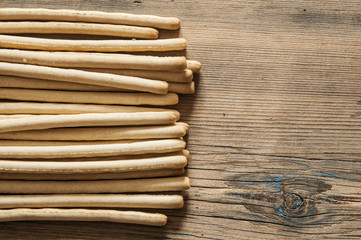 biscuit sticks on wood background