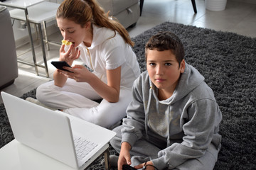 Boy and a girl at the computer