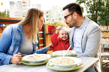 Family enjoying pasta