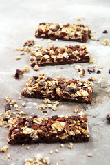 Granola bar. Healthy sweet dessert snack. Cereal granola bar with nuts, fruit and berries