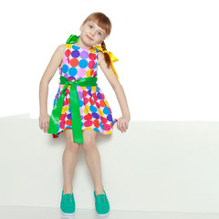 Girls looks because of the white obstacle.