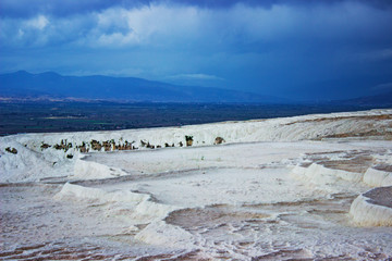 Natural travertine pools and terraces in Pamukkale closeup in springtime, May 2018, Turkey