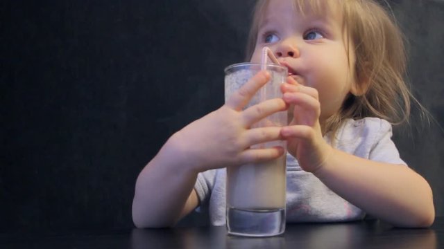 Little Girl Drinking Milkshake