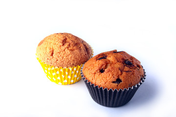 Tasty chocolate cupcakes, muffins on a white wooden table