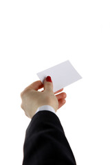 Female hand holding business card in office